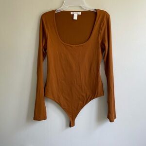 REVAMPED LONG SLEEVE SCOOP NECK BODY SUIT DOUBLE SNAP GUSSET STRETCH BROWN RUST
